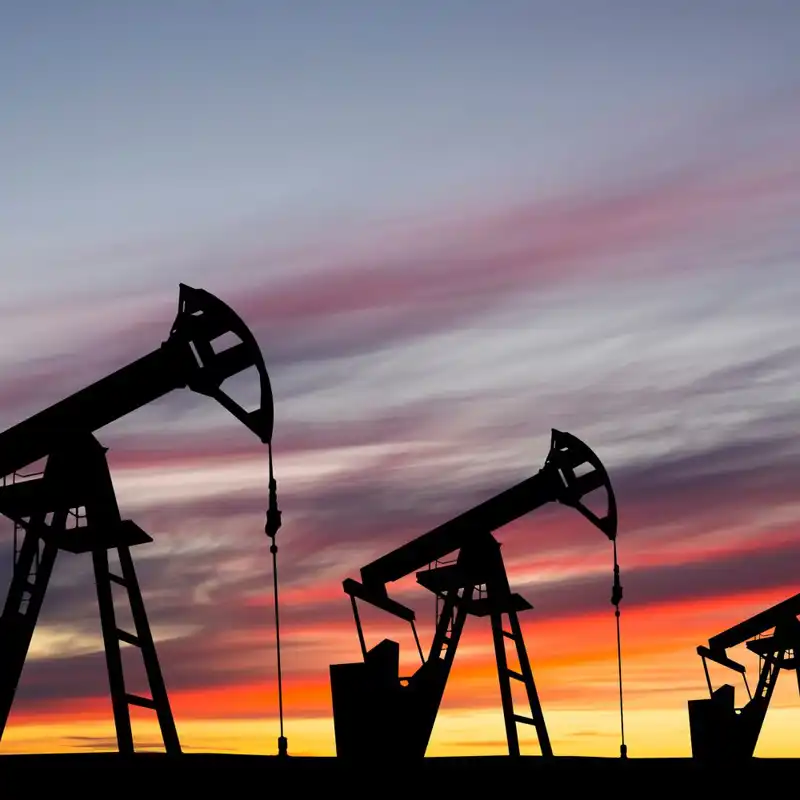 Oil pump on a sunset background.