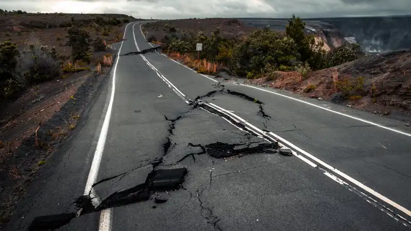 large crack in a highway following an earthquake