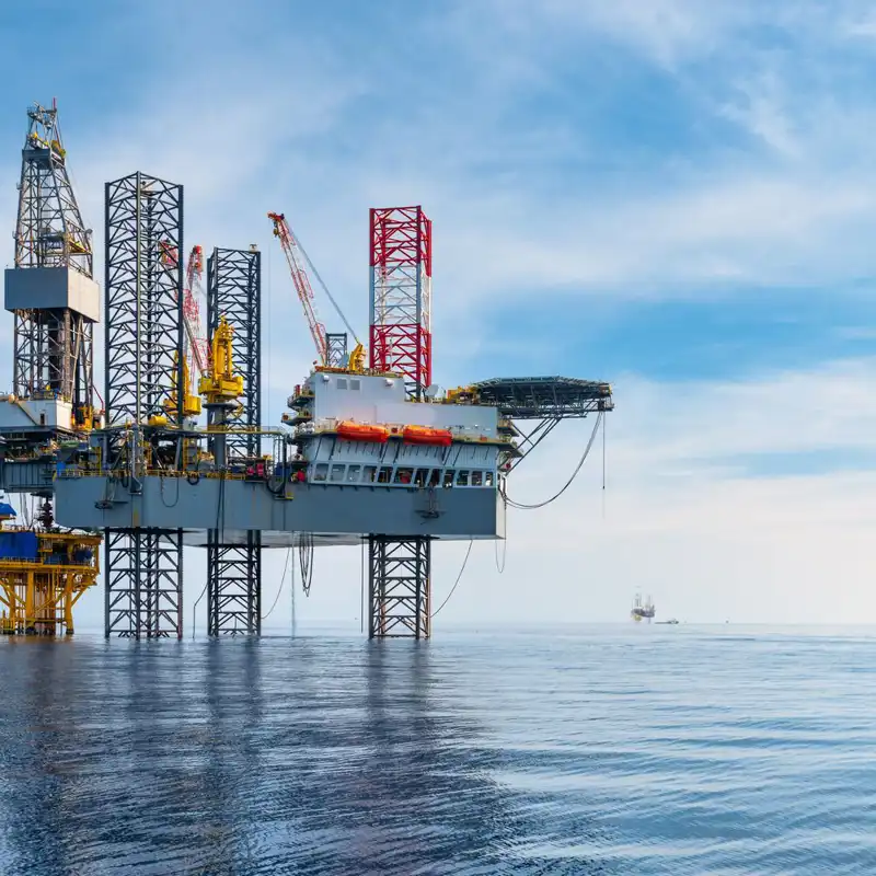 Oil rig drilling off shore.