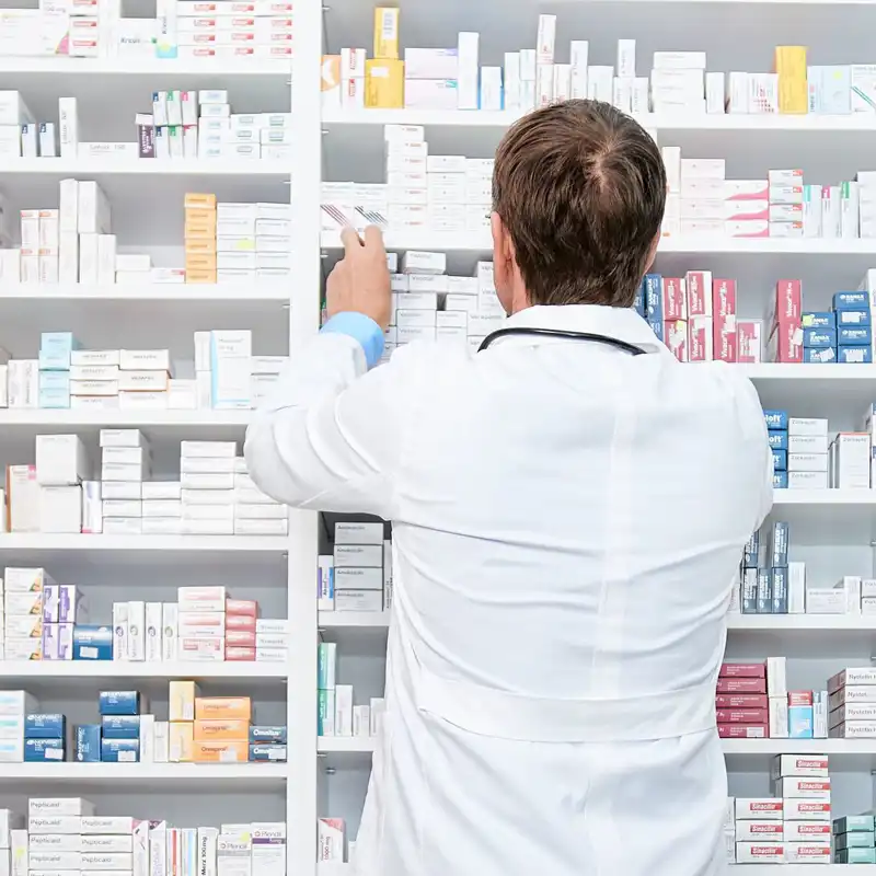 Pharmacist working in a drugstore.