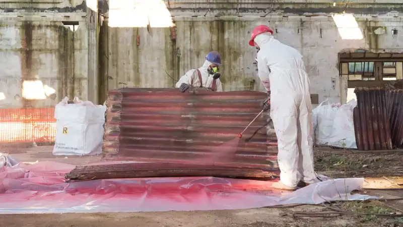 Workers doing an environmental asbestos removal.