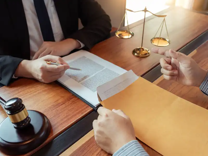 Notary lawyer or judge consult or discussing contract papers with Businessman client in office