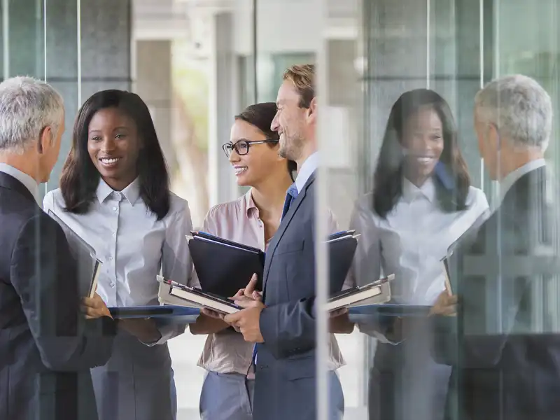 Group of professionals smiling.