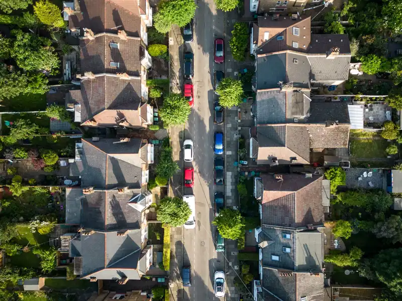 Aerial view of a suburban street.