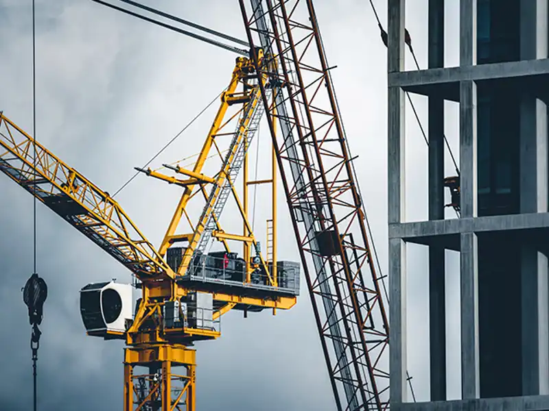 close up of a crane working in building construction
